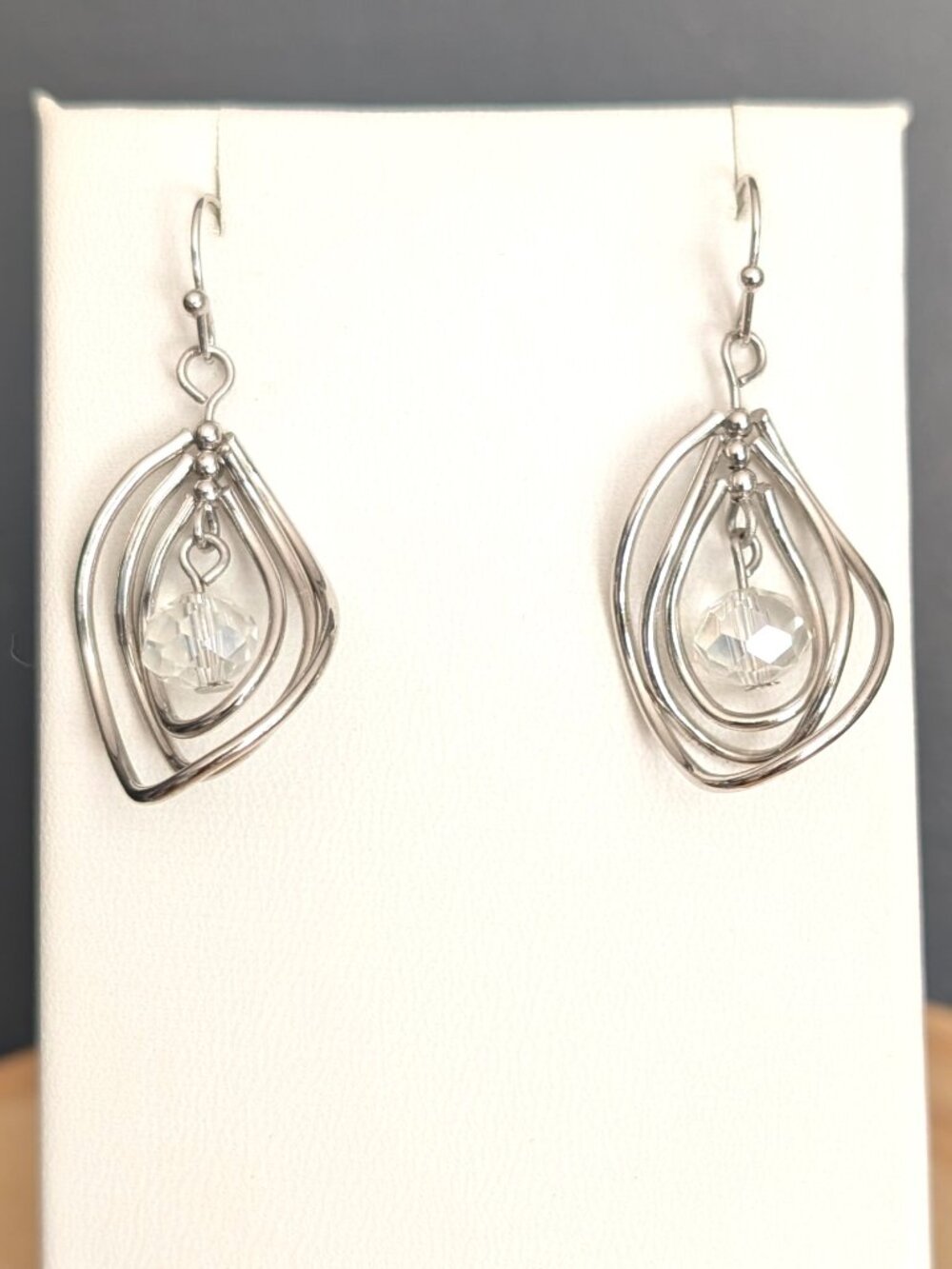 3 silver curved hoops with faceted clear crystal bead dangle earrings